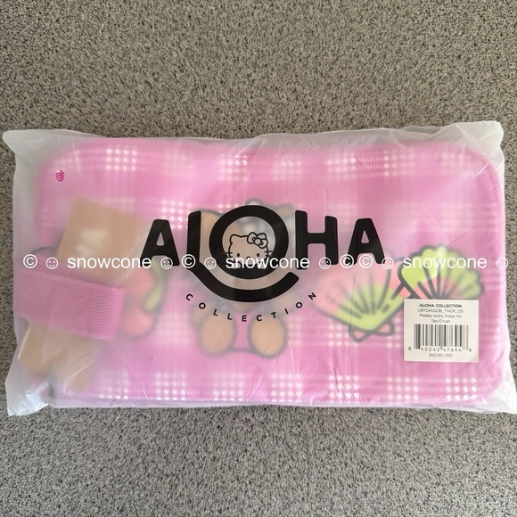 Aloha Collection x Sun kissed Hello Kitty Hawaii Exclusive Pink Palaka Dopp Kit - Picture 5 of 10